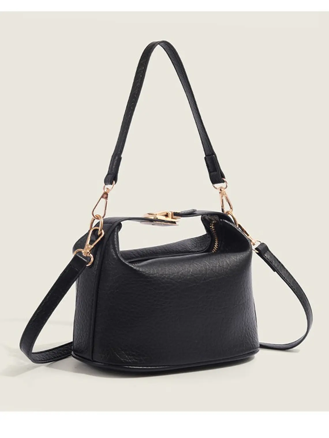 Bolso caja compacto de cuero sintético con asa giratoria dorada — estilo estructurado cotidiano 9