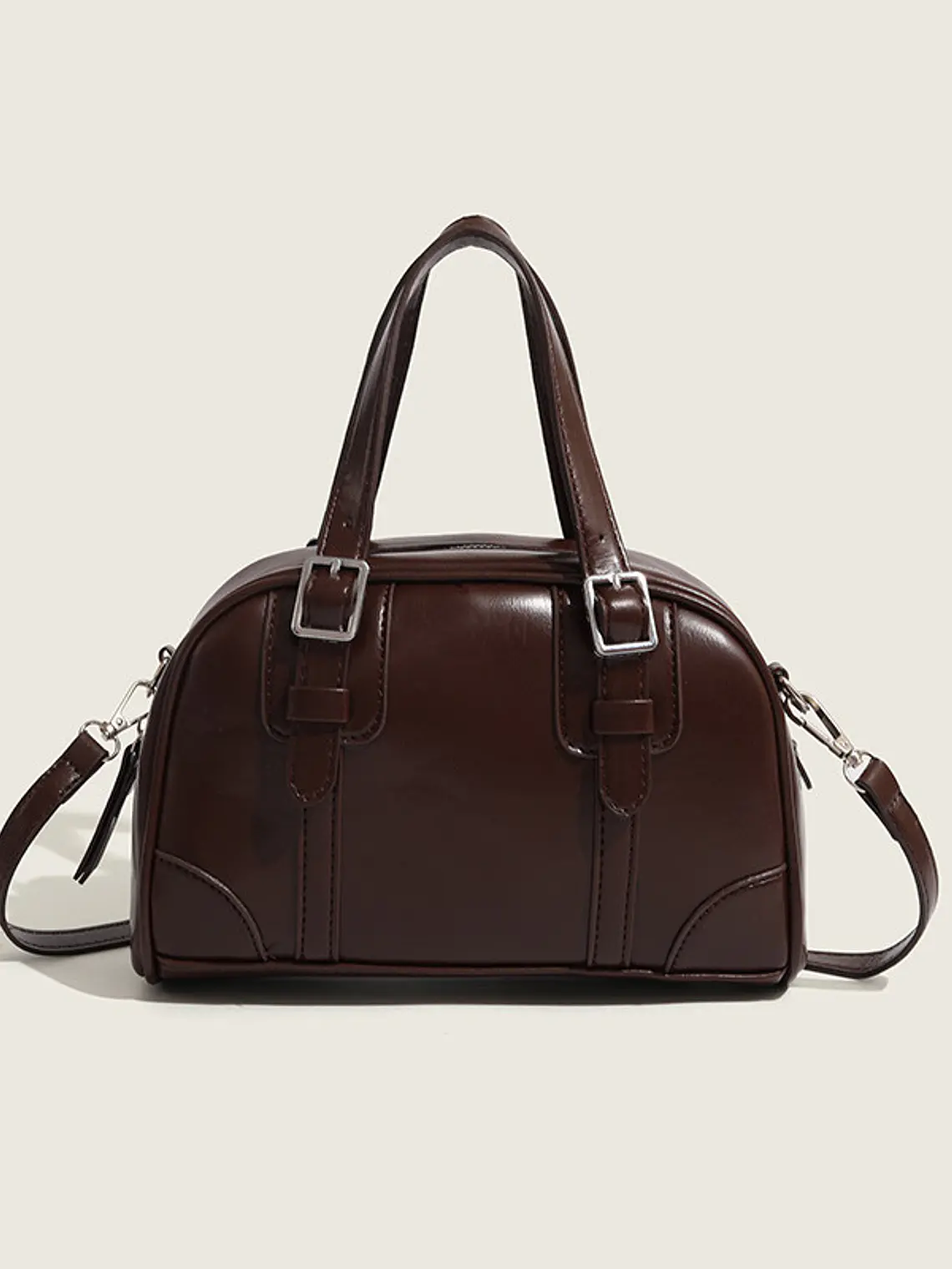 Bolso de mano tipo cápsula con hebillas plateadas y costuras decorativas — estilo retro coreano 1