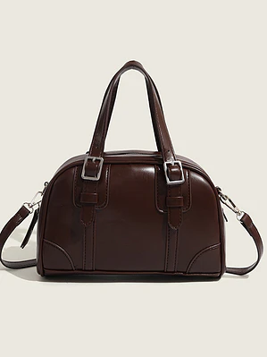 Bolso de mano tipo cápsula con hebillas plateadas y costuras decorativas — estilo retro coreano