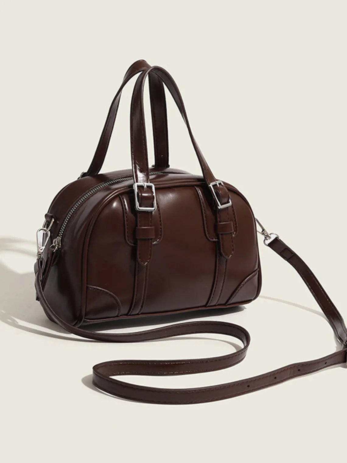 Bolso de mano tipo cápsula con hebillas plateadas y costuras decorativas — estilo retro coreano 3
