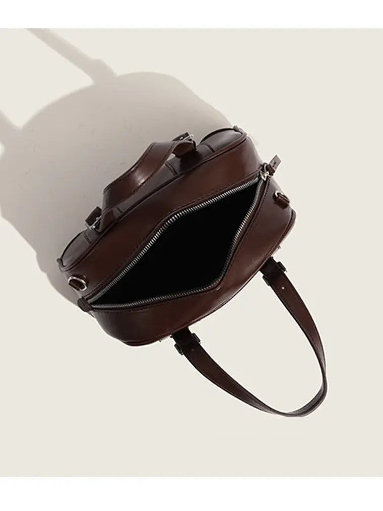 Bolso de mano tipo cápsula con hebillas plateadas y costuras decorativas — estilo retro coreano 7