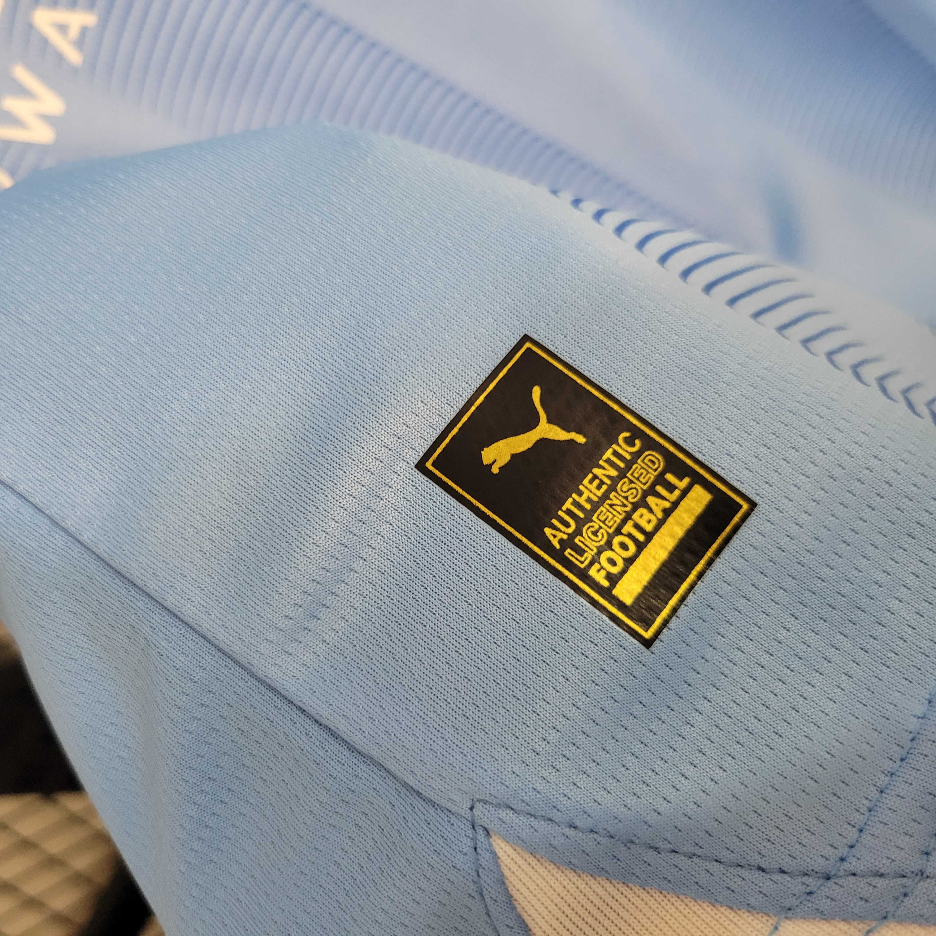 KIT CRIANÇA MANCHESTER CITY HOME 23-24 3
