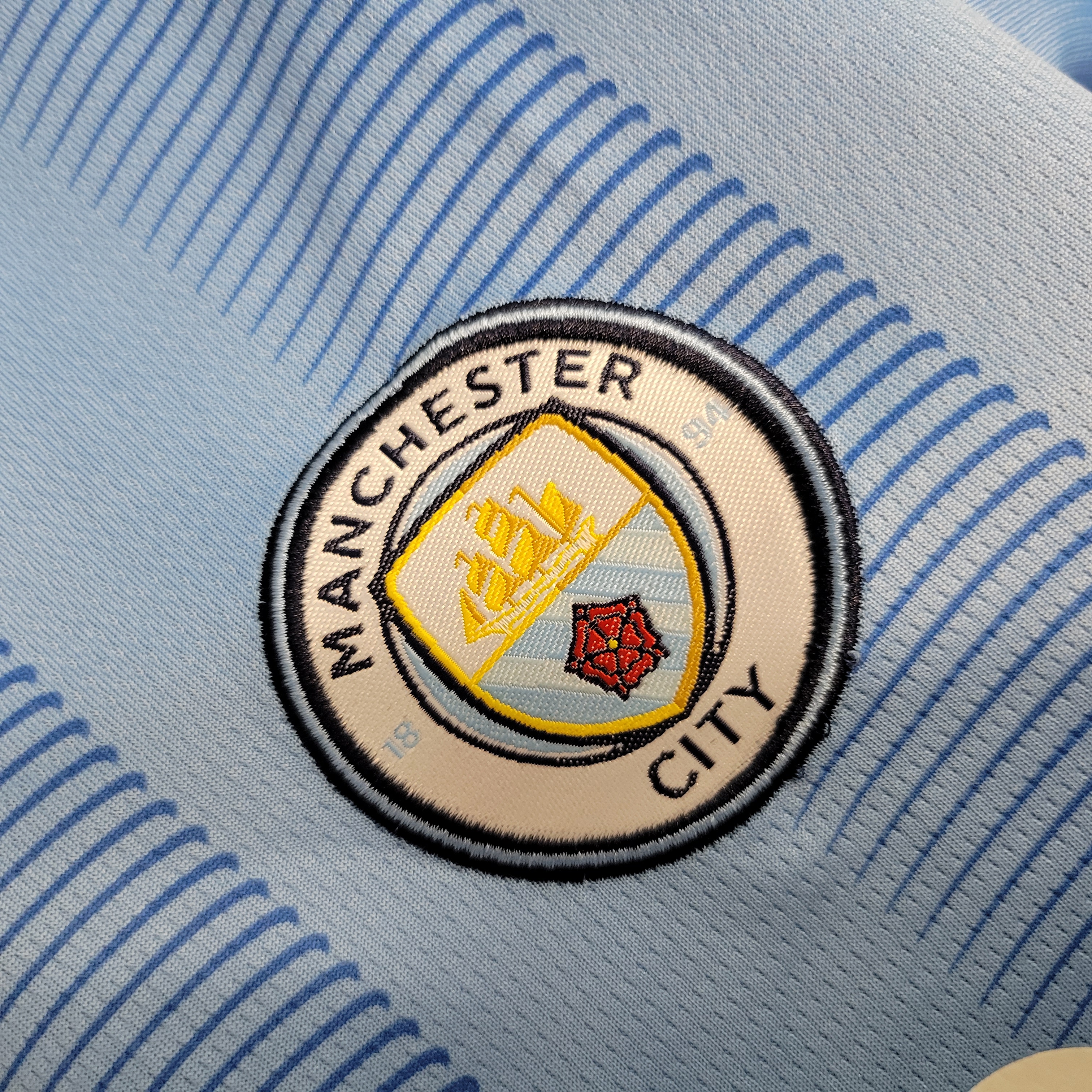 KIT CRIANÇA MANCHESTER CITY HOME 23-24 2