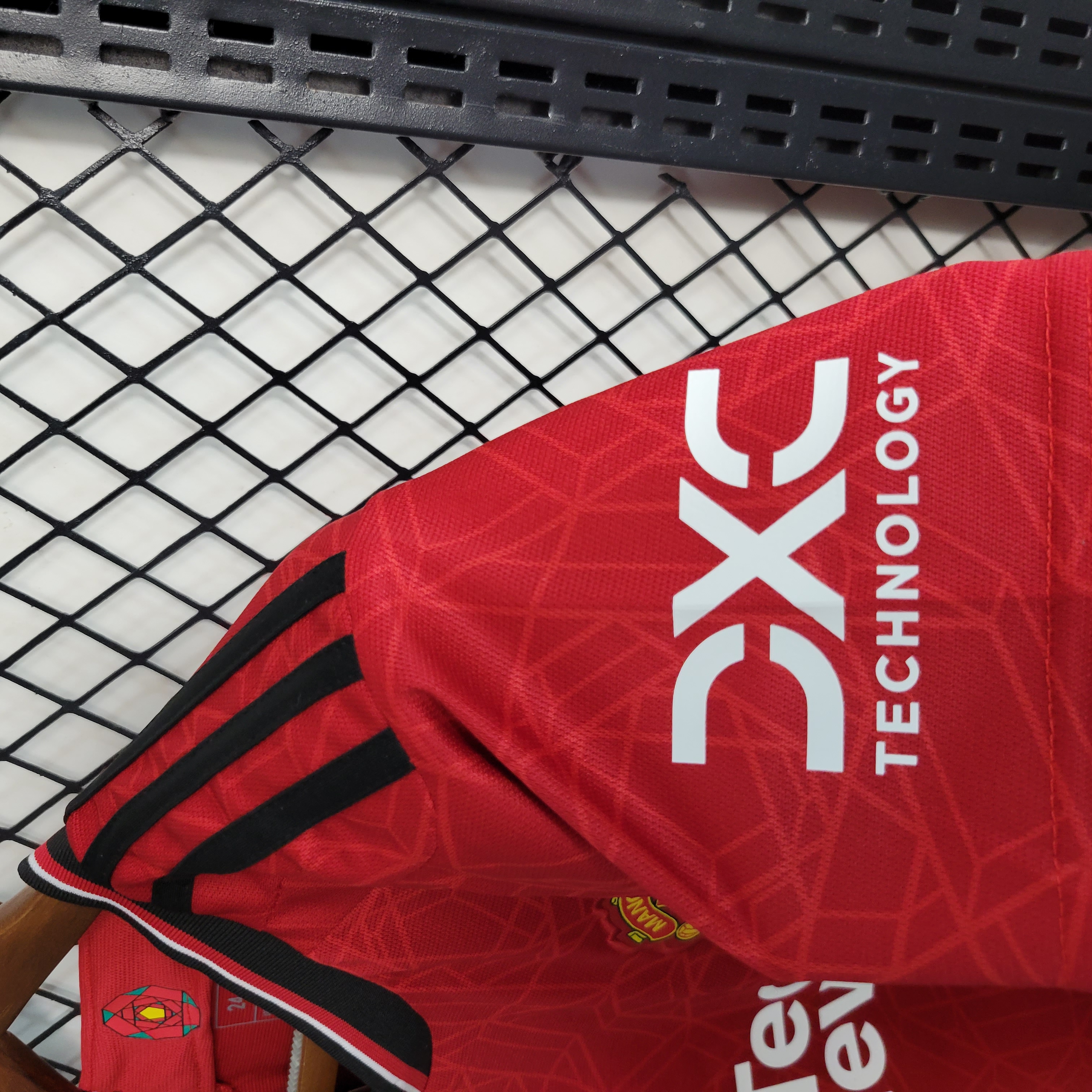 KIT CRIANÇA MANCHESTER UNITED HOME 23-24 4