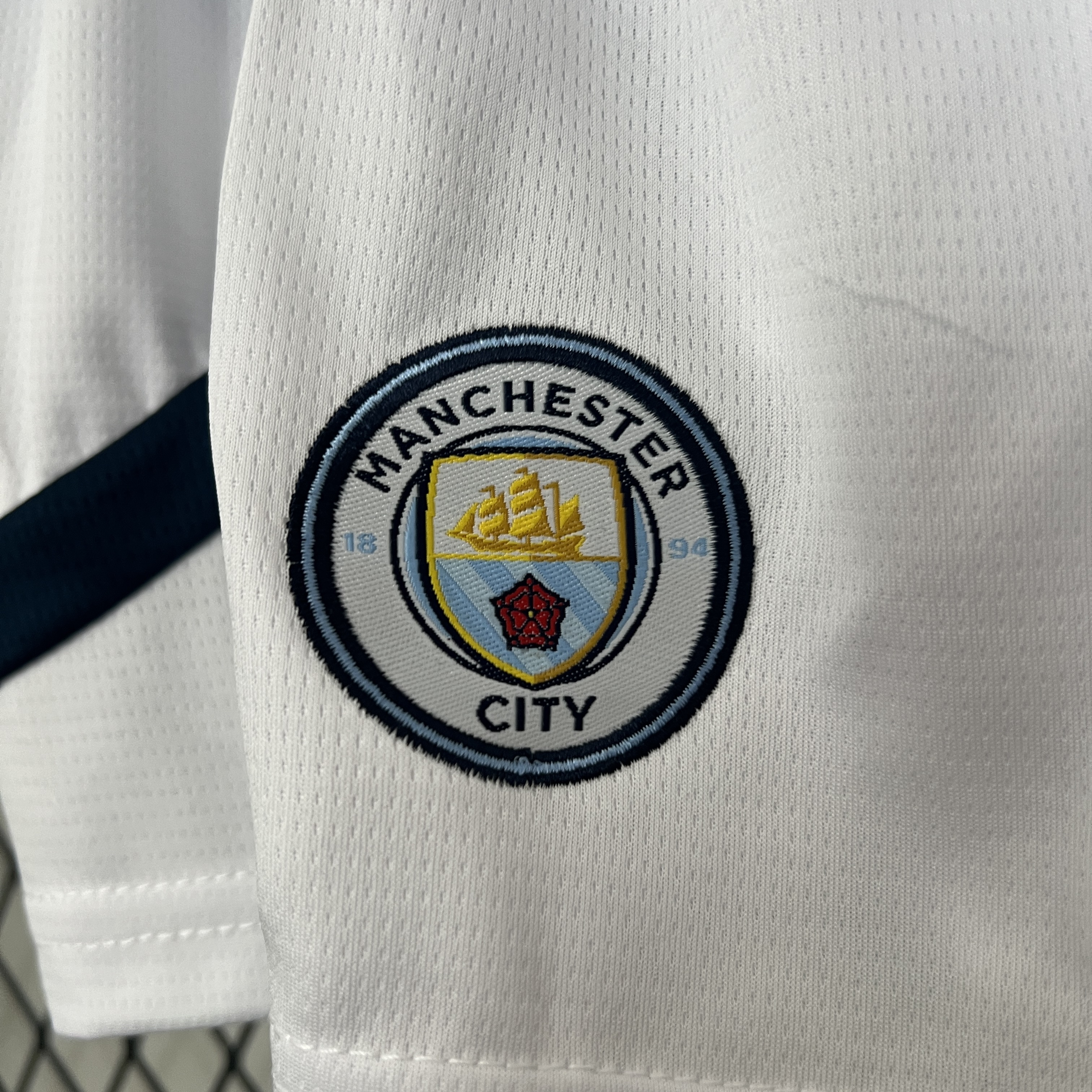 KIT CRIANÇA MANCHESTER CITY HOME 24-25 5
