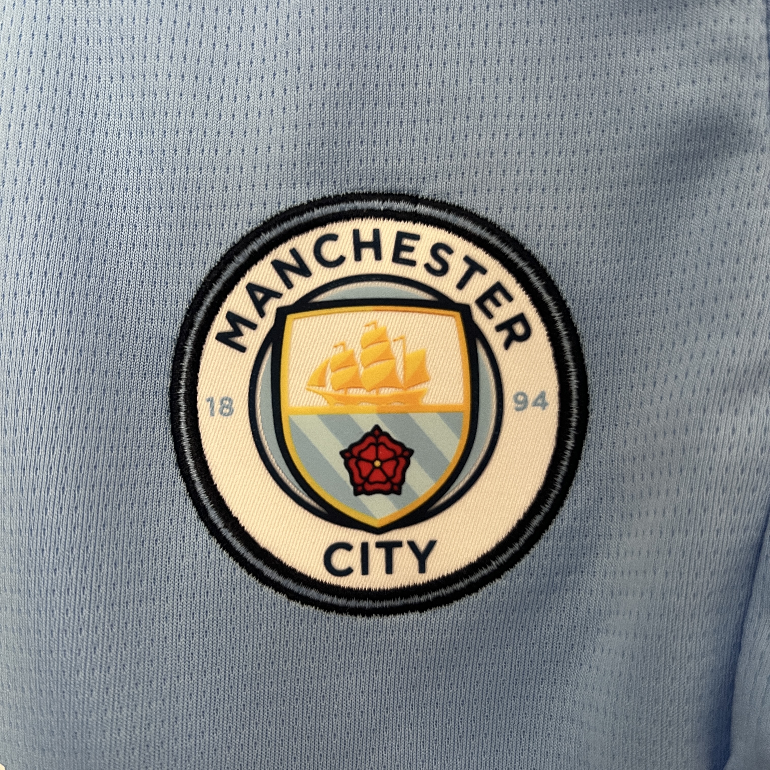 KIT CRIANÇA MANCHESTER CITY HOME 24-25 2