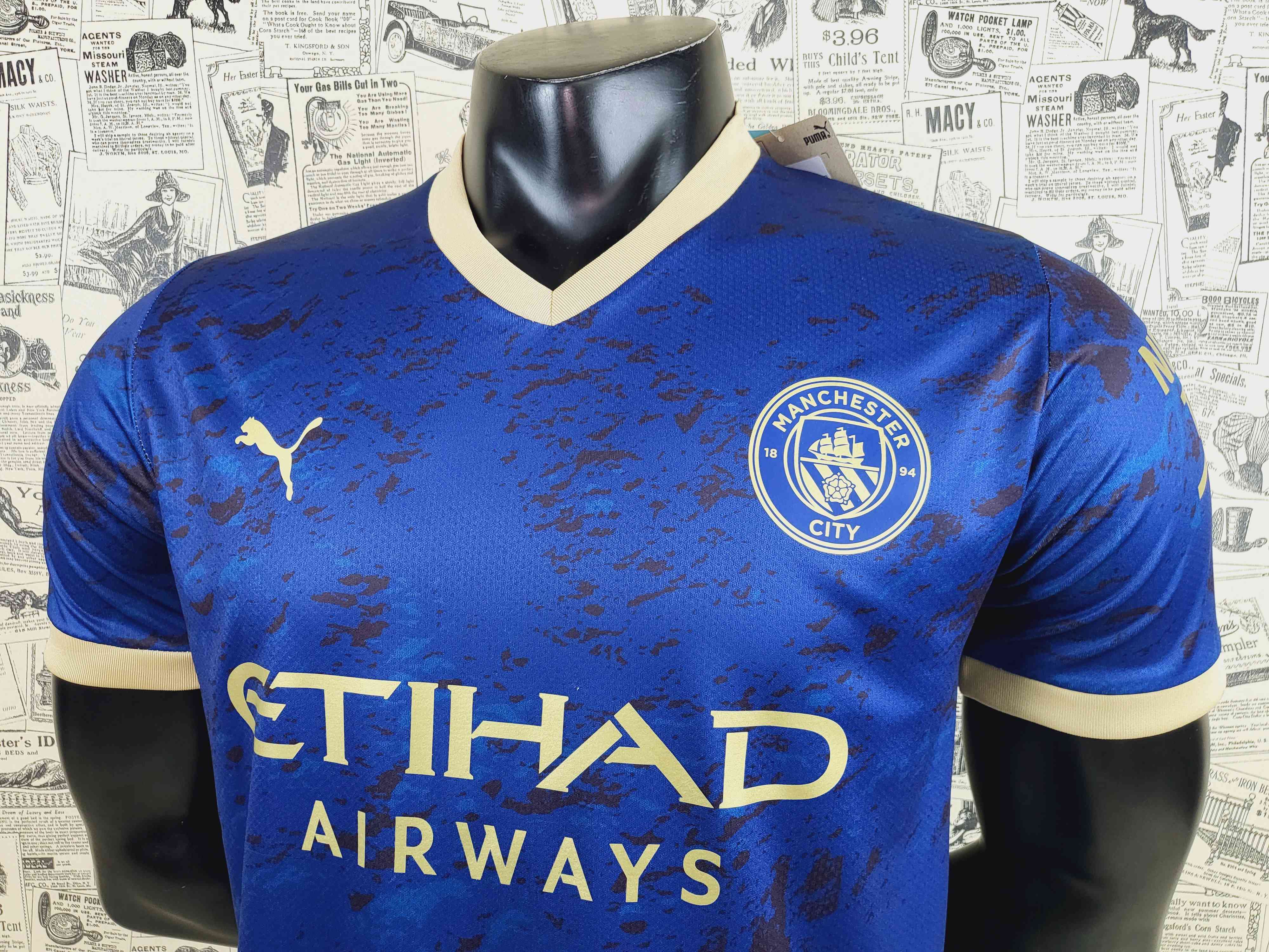 Camisola Man City edição comemorativa 22/23 - Versão Adepto 11