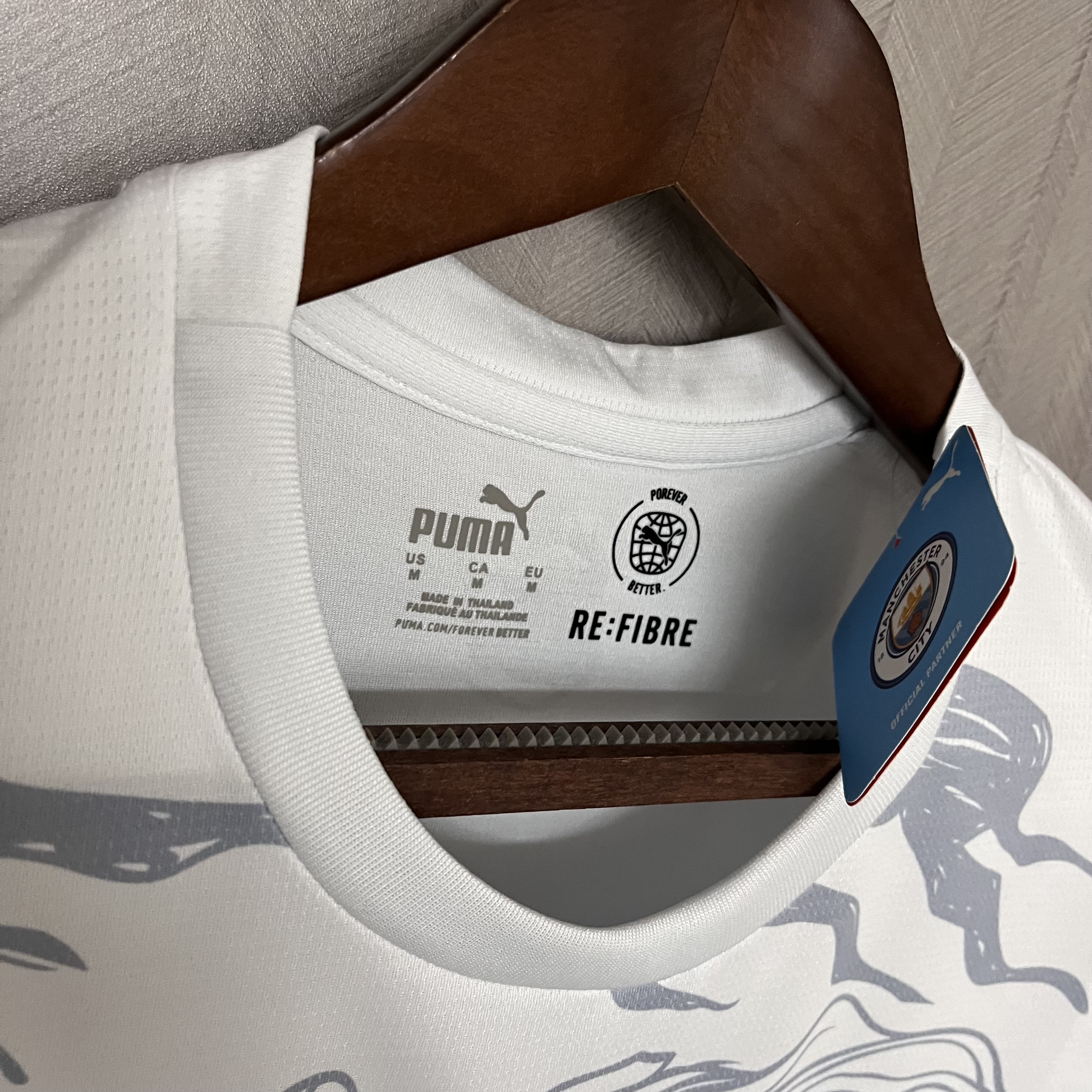 Camisola Man City edição comemorativa 23/24 - Versão Adepto 10