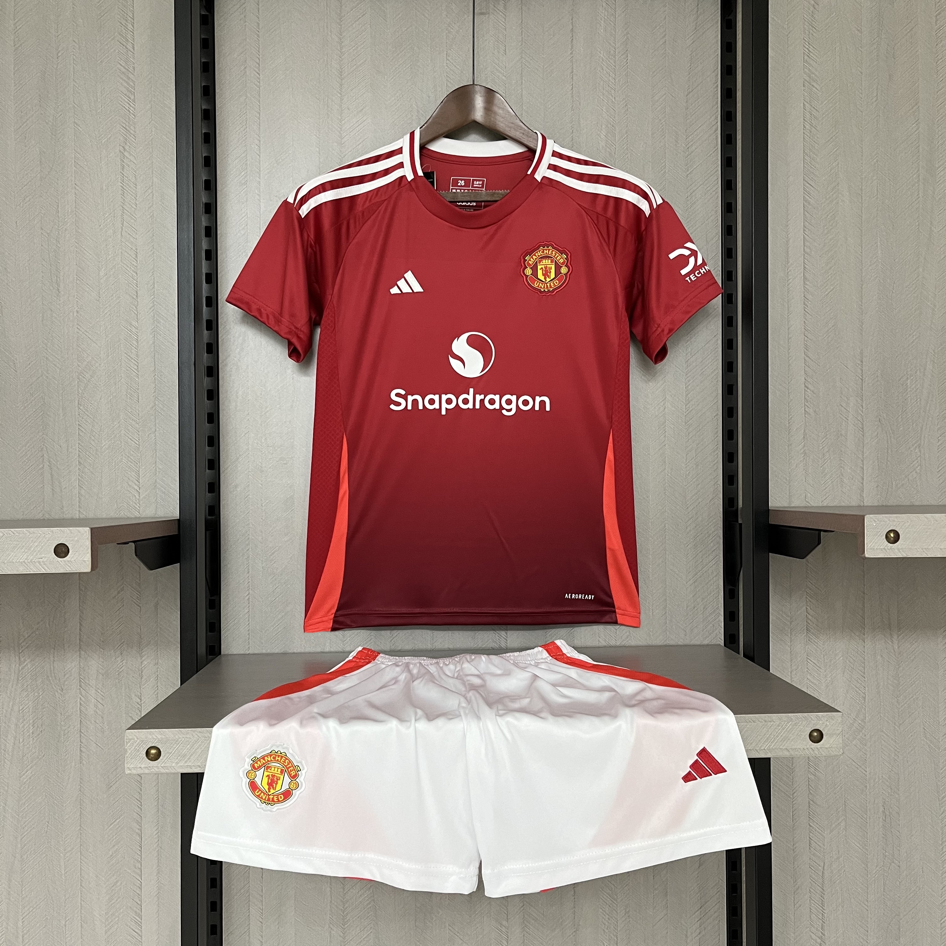 Kit Criança Man Utd principal 24/25 1