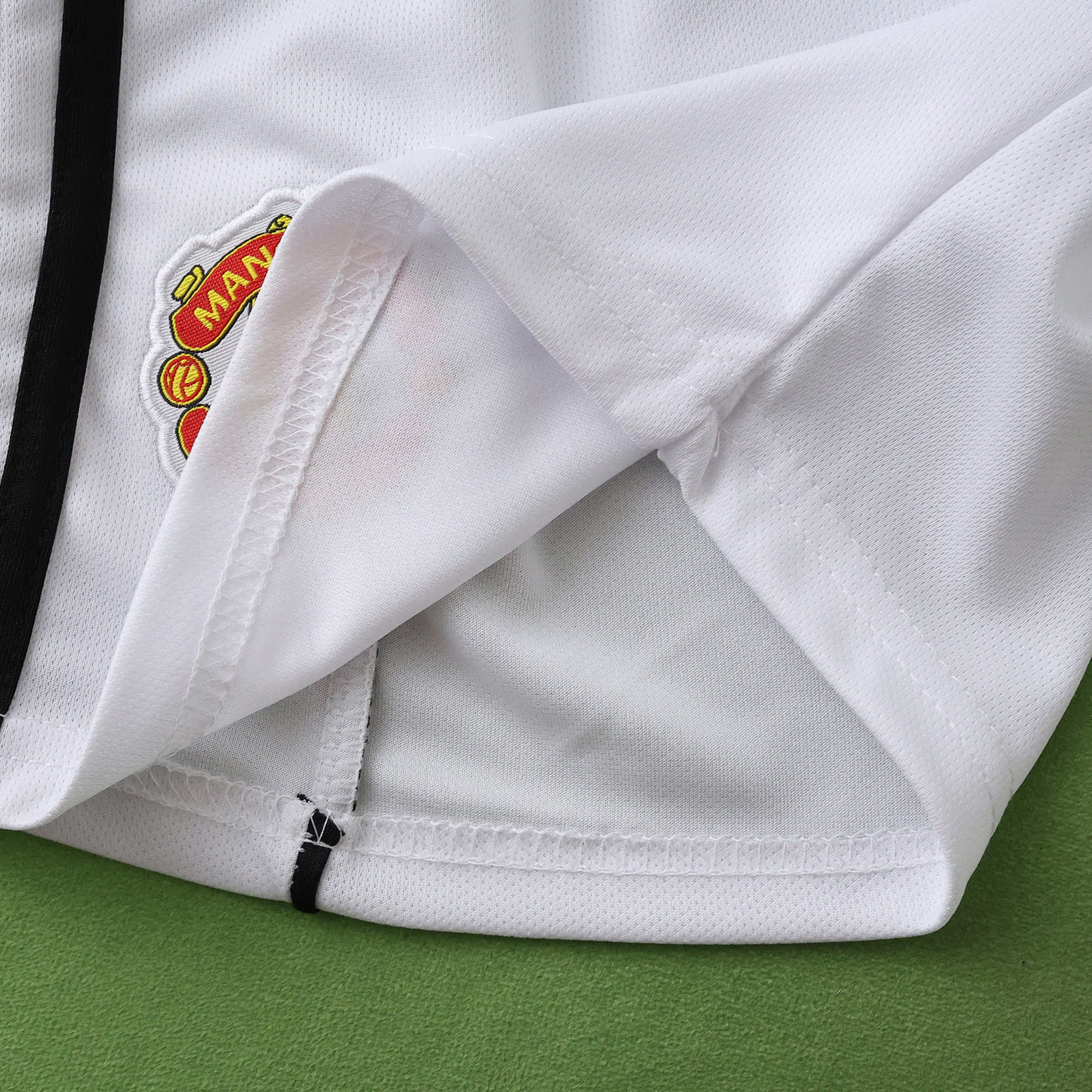 Kit Criança Man Utd principal 25 /26 26