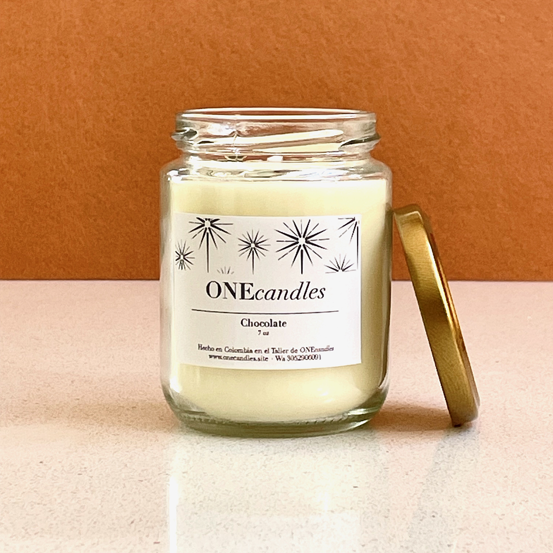 Vela Esencial Tapa Dorada 7 oz 1