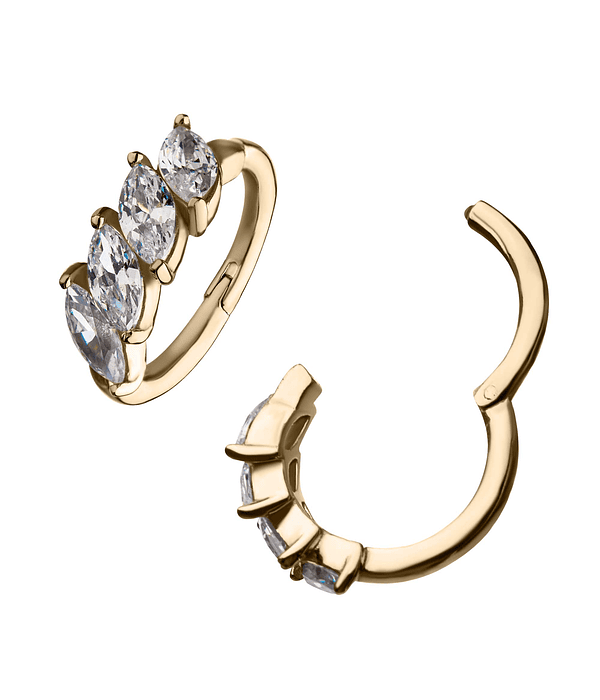 Clicker con 4 zirconias cristal marquesa prong set en oro 