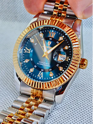 Relógio Luxuoso em aço 316 L Prata e Dourado sobre Azul.