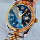Relógio Luxuoso em aço 316 L Prata e Dourado sobre Azul. - Thumbnail 2