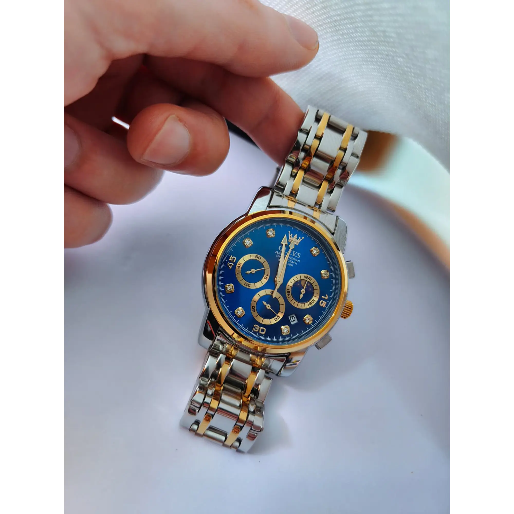 Relógio Cronómentro em aço inox Dourado e Prata, com Azul Marinho. 10