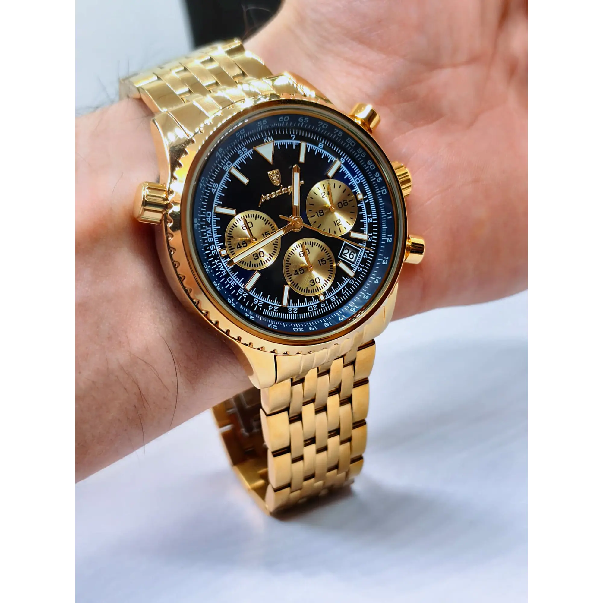 Montre chronographe pour homme en or avec cadran bleu 9