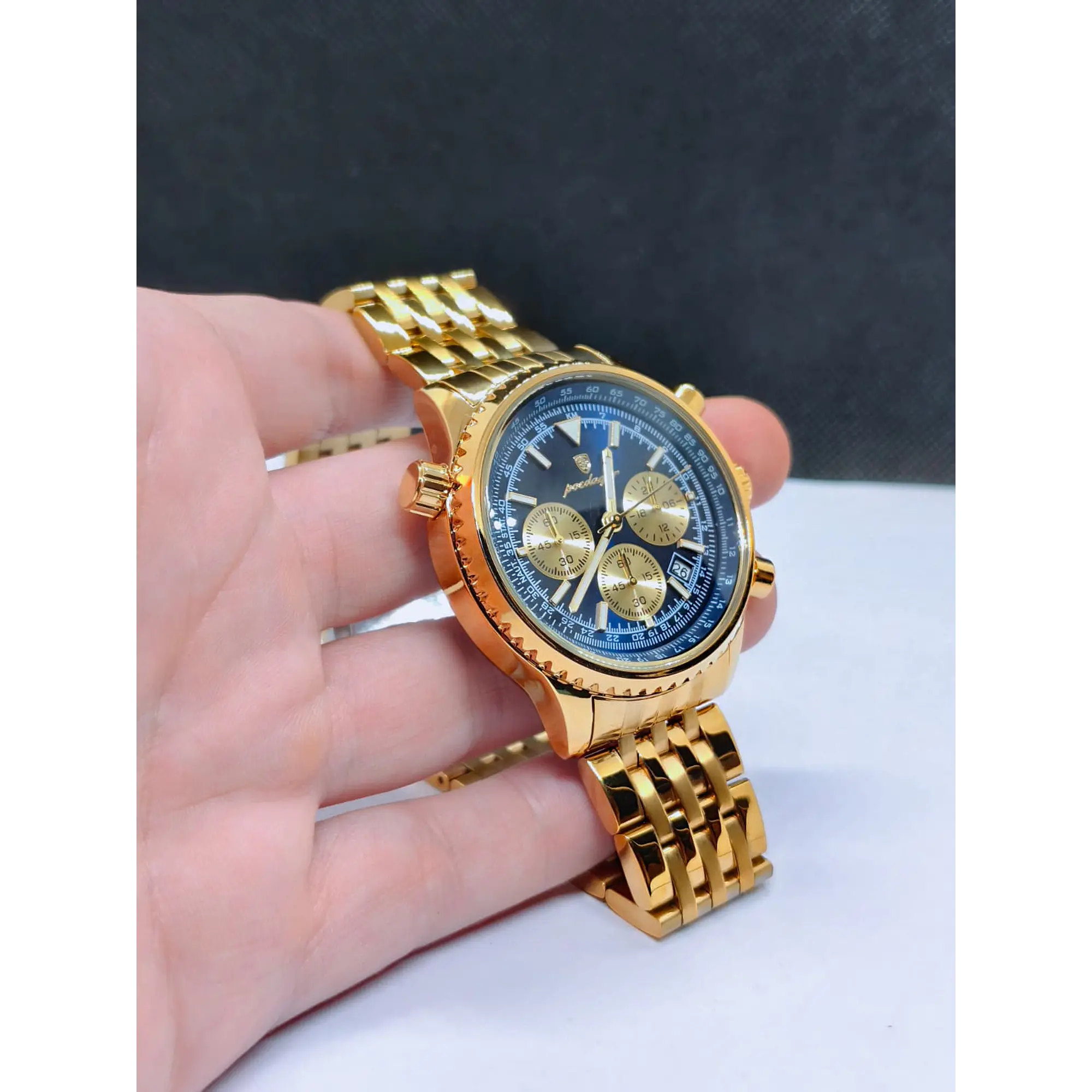 Montre chronographe pour homme en or avec cadran bleu 8