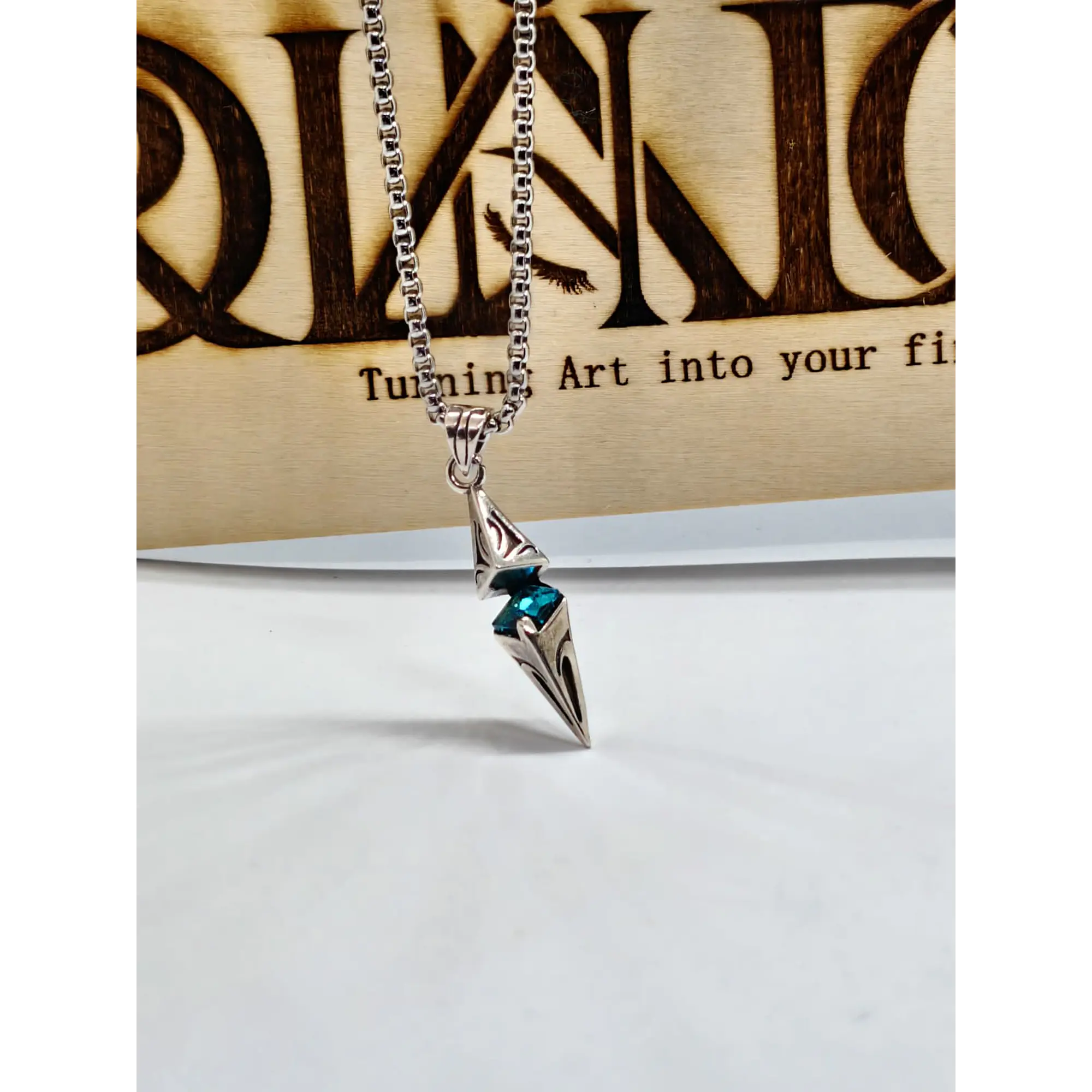 Collier avec pendentif double géométrique et cristal bleu turquoise 1