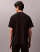 Playera Negra Graphic Seasonal De Hombre Calvin Klein - Miniatura 2