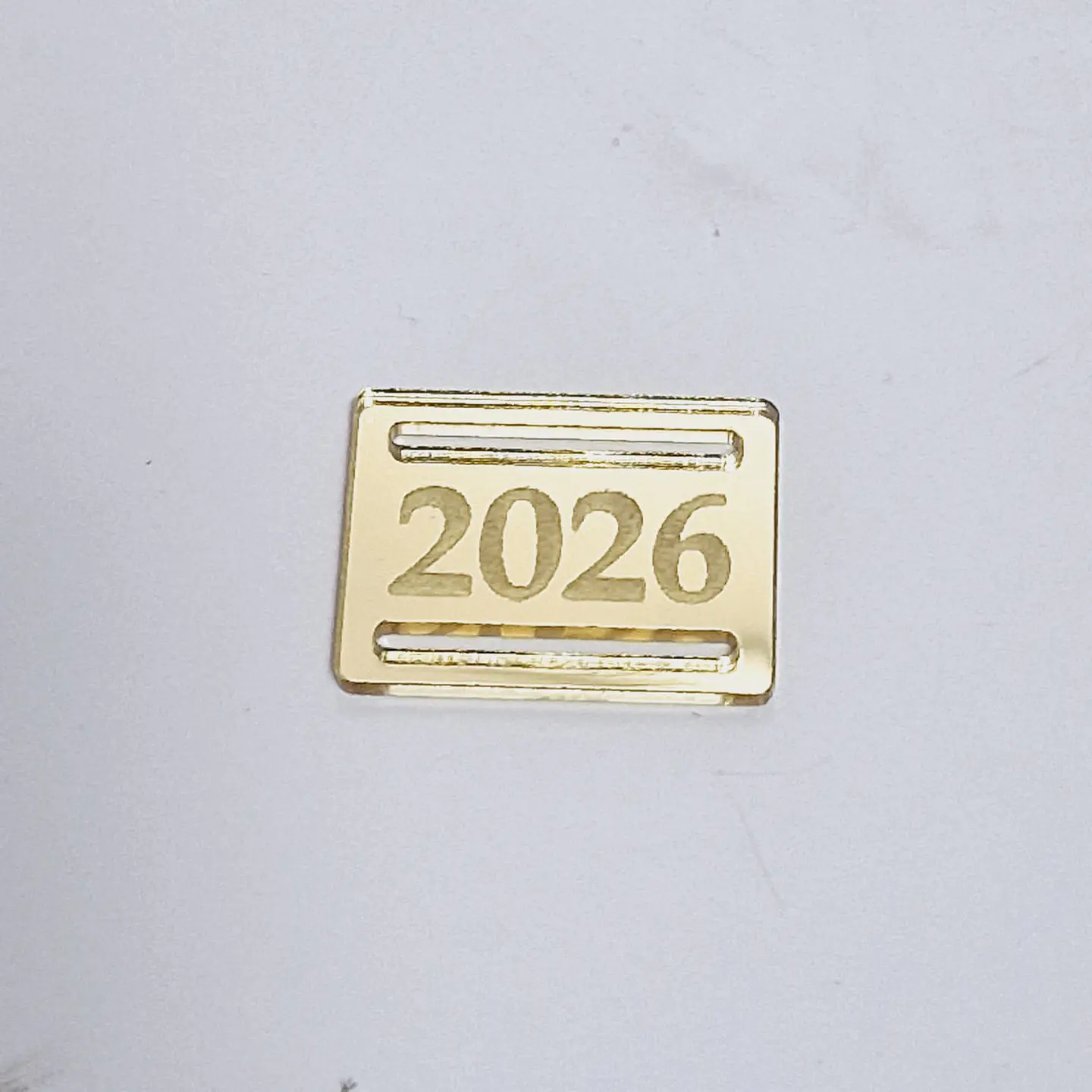 Dijes - Hebillas para Medallas año 2026 2