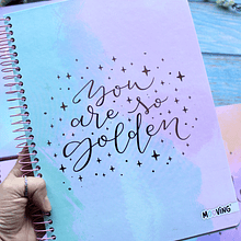 Cuaderno tres materias modelo Golden