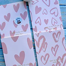 Libreta cosida diseño corazones 