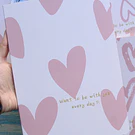 Libreta cosida diseño corazones 
