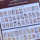 Libro de stickers y papel decorativo