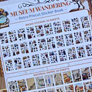 Libro de stickers y papel decorativo