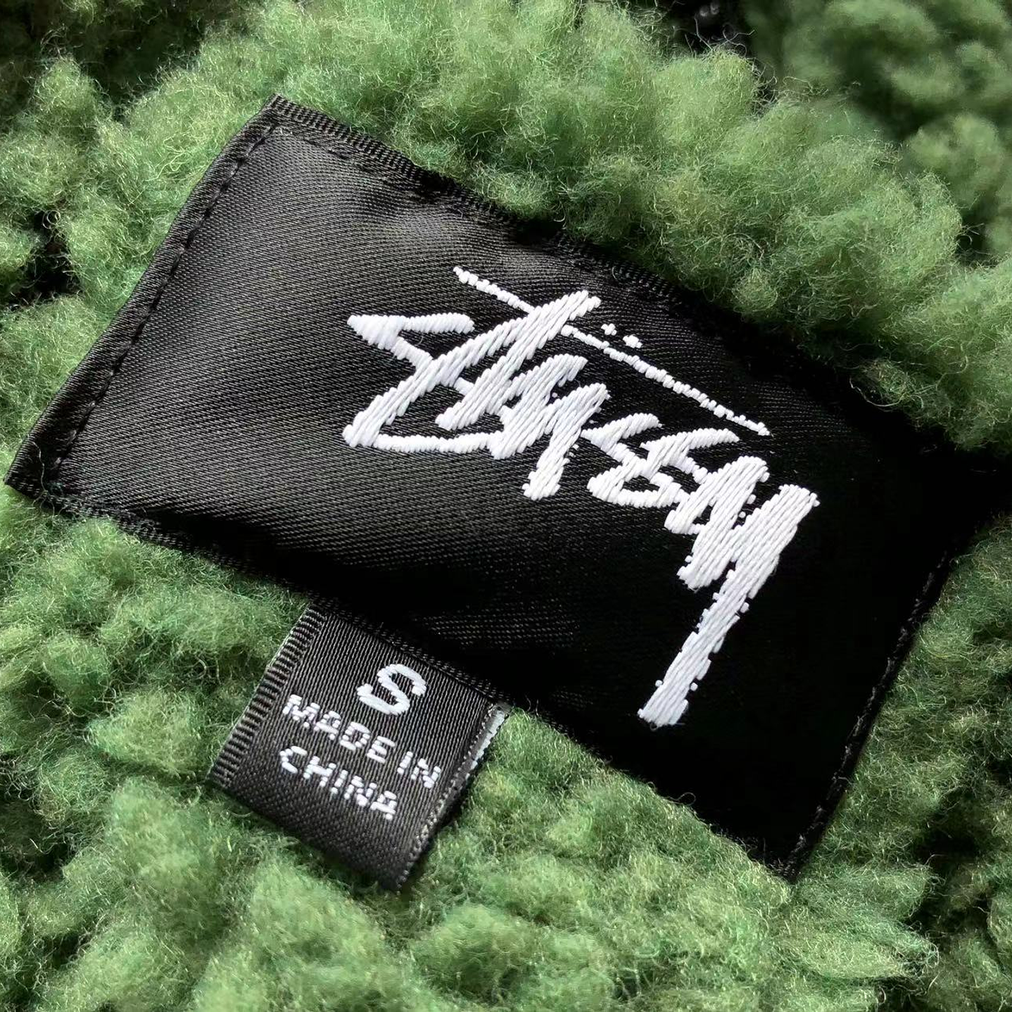 Sherpa stussy 8 ball verde reversible 12