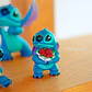 Estatua Stitch con Ramo de Flores - Disney Originals Showcase - Miniatura 1