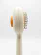 Cepillo removedor con botón para retiro del pelo - Miniatura 2