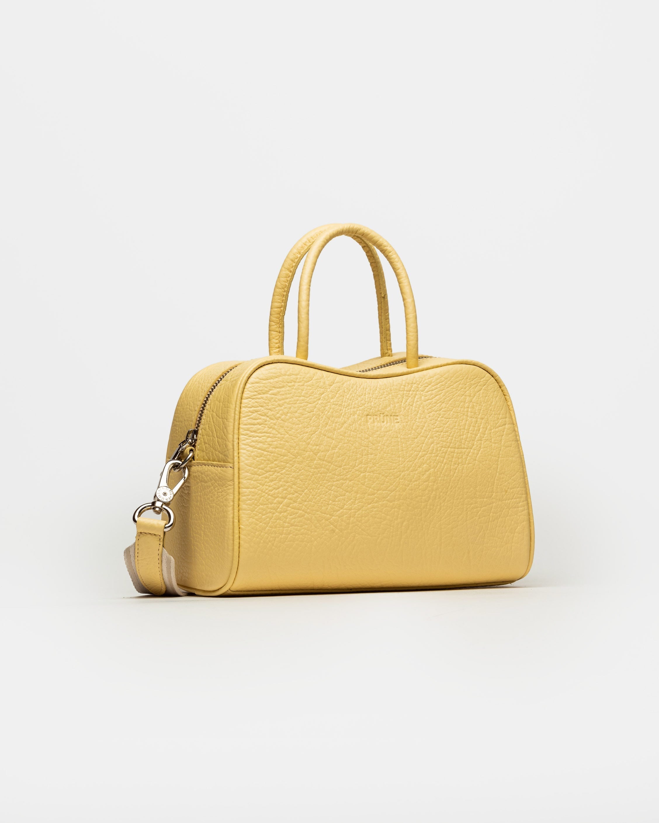 CARTERA DE MANO THE CLUB EN CUERO GRANEADO 2