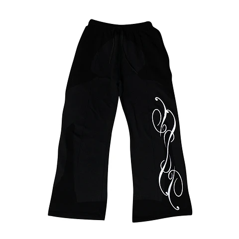 Pantalones Negra Odisea Flare Fit