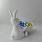 Figura Decorativa De Conejita De Pascua Con Cesta De Huevos - Miniatura 1
