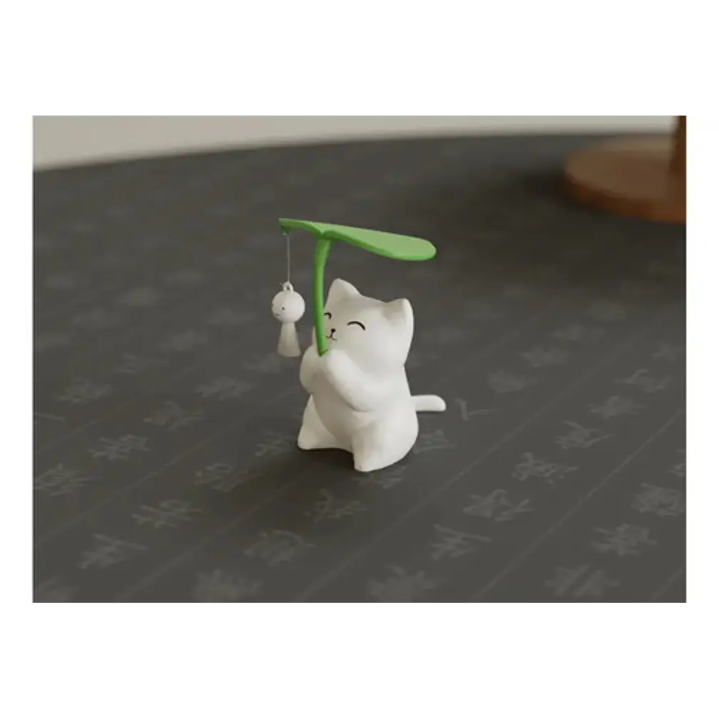 Figura Decorativa Gatito Sosteniendo Una Hoja 1