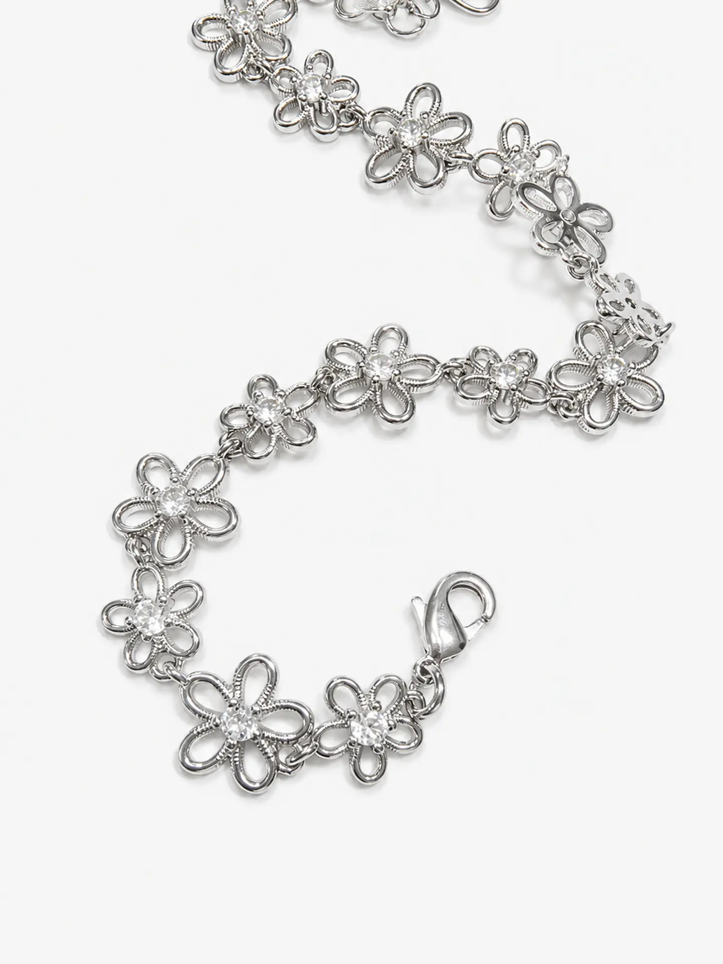 Pulsera plata flores caladas con circón 3