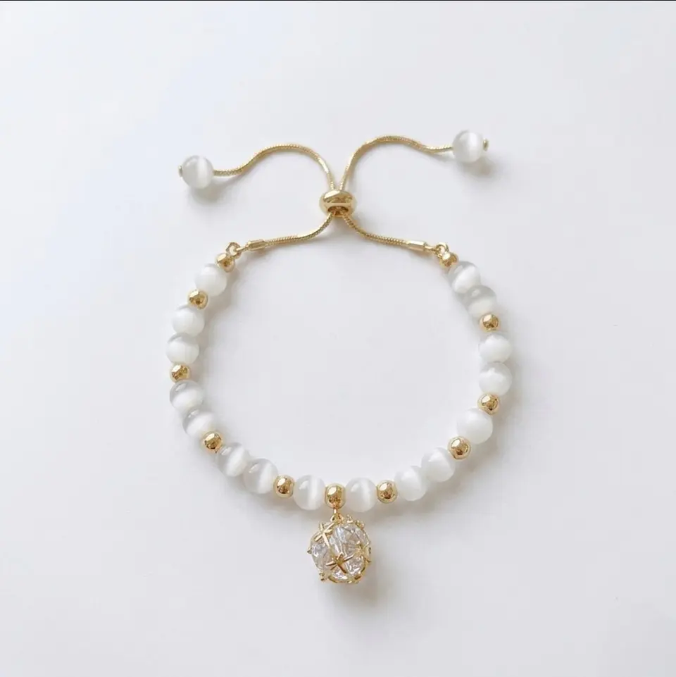 Pulsera ojo de gato colgante cristal 1