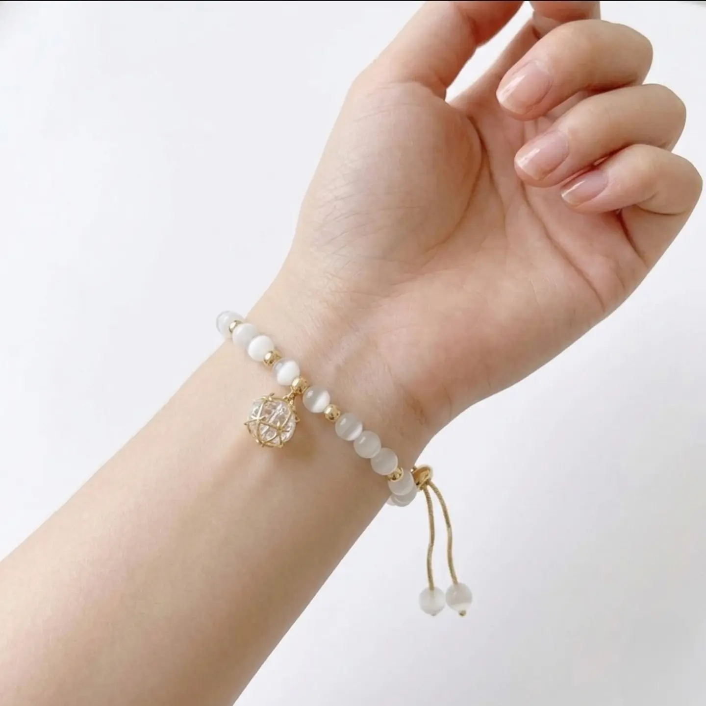 Pulsera ojo de gato colgante cristal 2