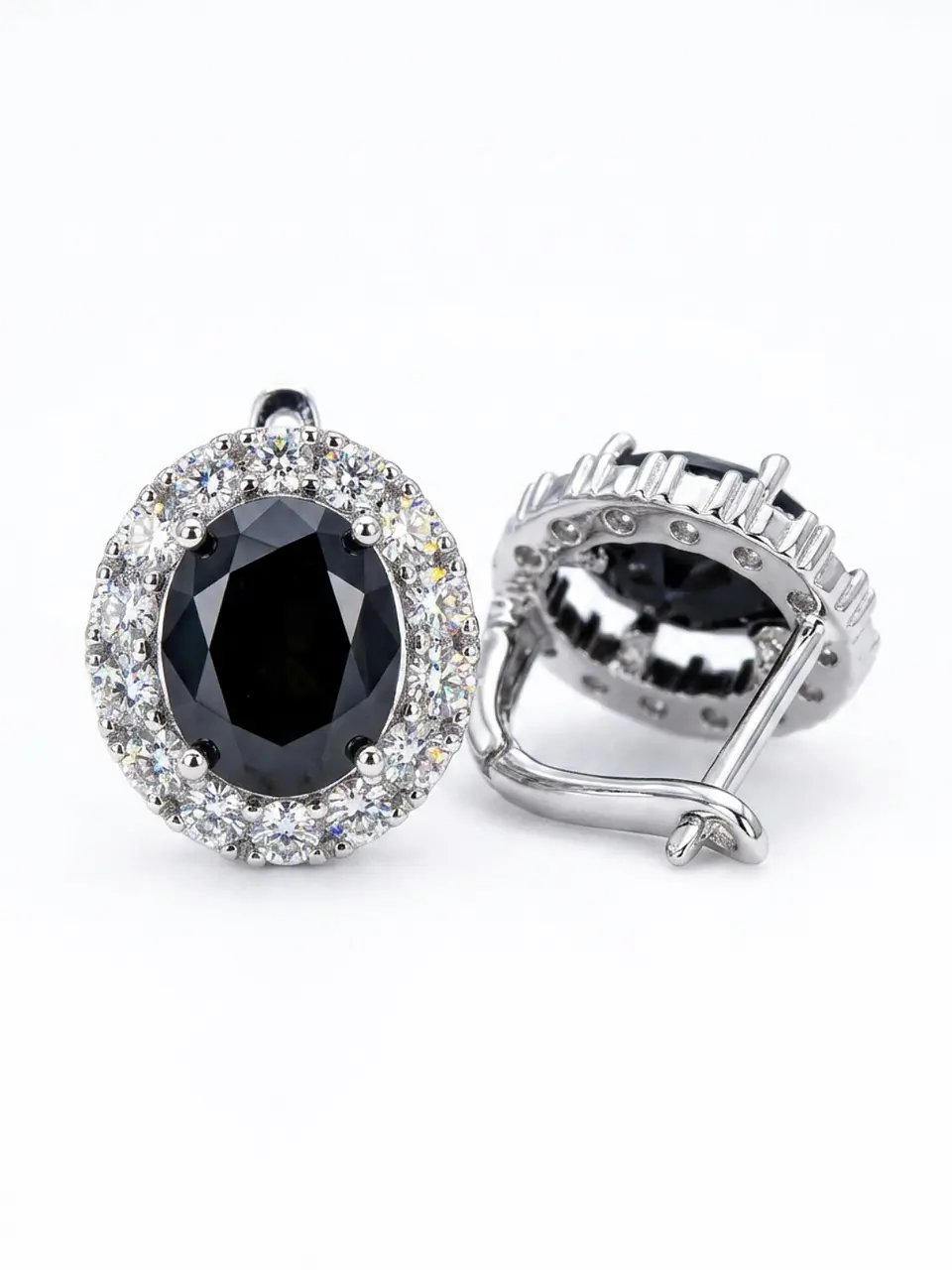 Aros piedra negra ovalada con halo de circonias 1