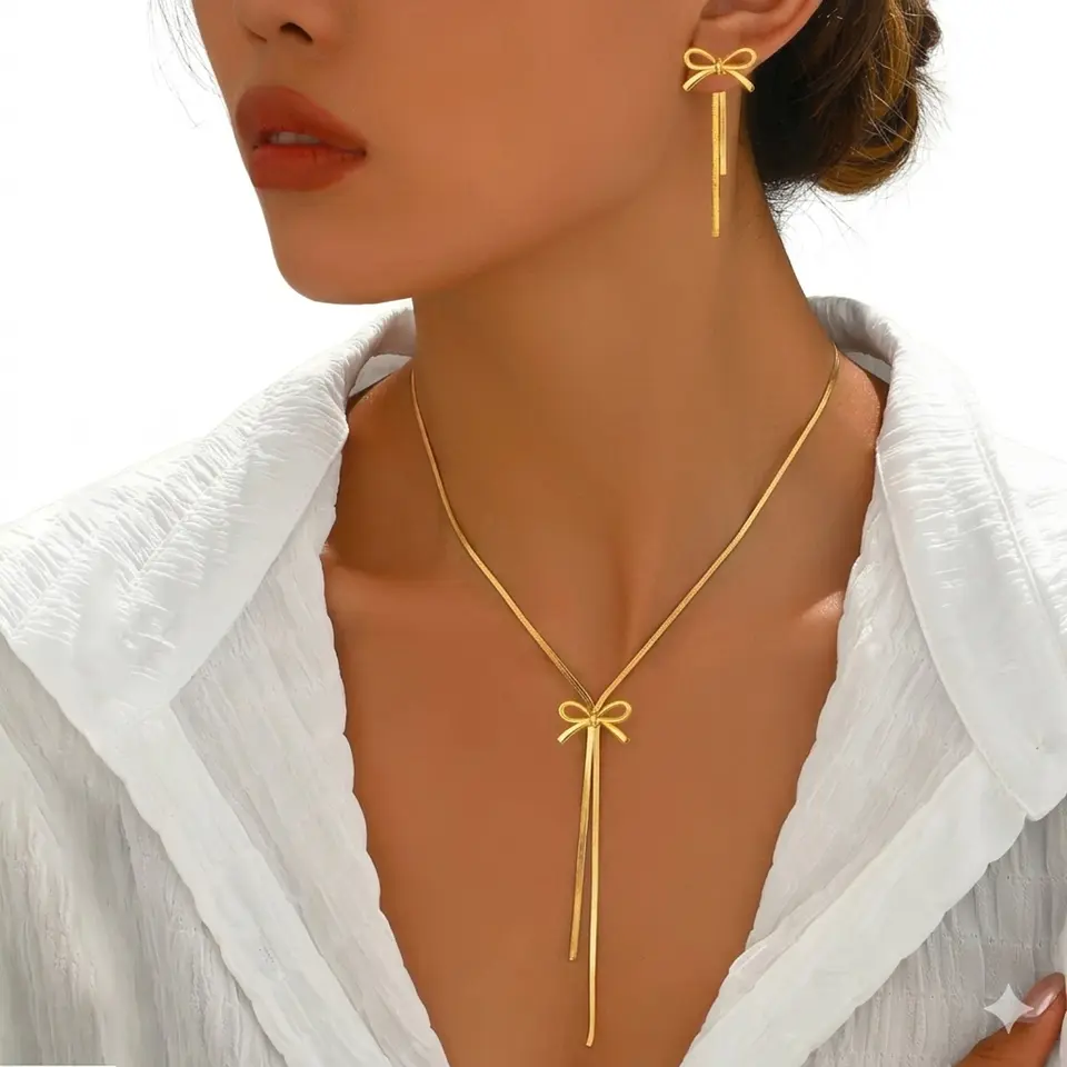 Conjunto dorado moño estilizado 2