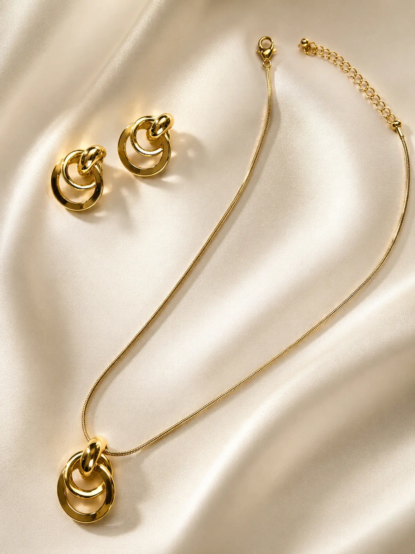 Conjunto dorado argollas concéntricas 4