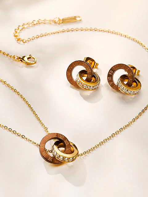 Conjunto círculos entrelazados con perlas