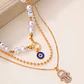 Conjunto dorado perlas y dije Hamsa - Miniatura 3