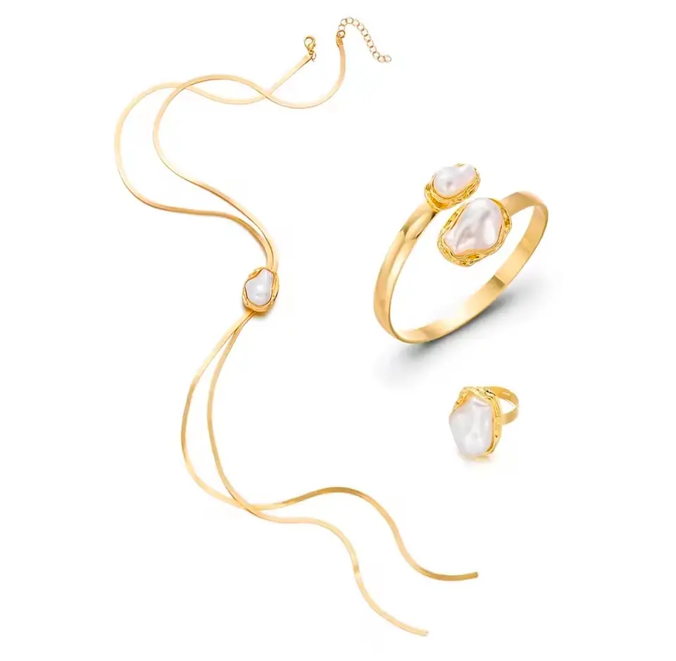 Conjunto dorado perlas barrocas estatement 1