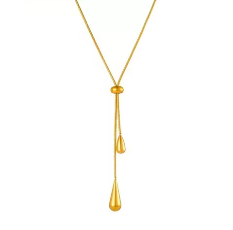 Collar lazo dorado con dijes de gota