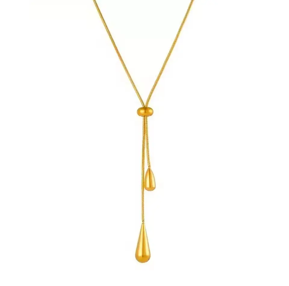 Collar lazo dorado con dijes de gota 1