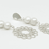 Aros largos de plata y perlas naturales