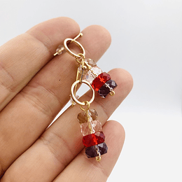 Aros dorados con mix cristales rojos