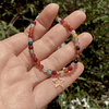 Pulsera piedras multicolor y Estrellita dorada